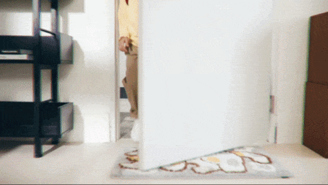 Robot cat giving high five to girl.